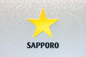 Sapporo Breweries sign and logo